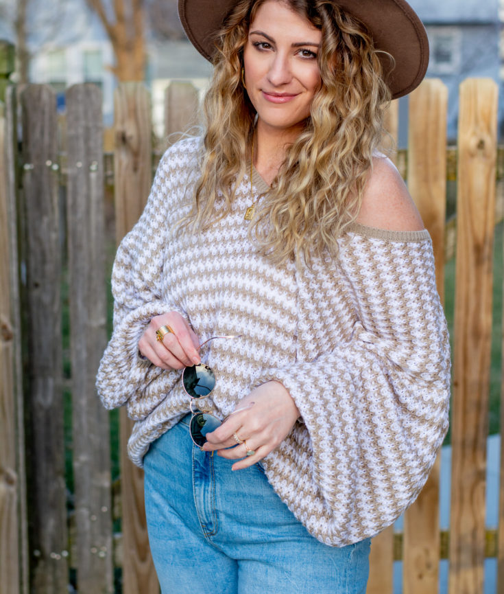 Striped Mocha and White Sweater + Wide-leg Jeans.