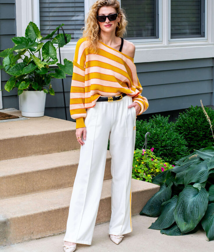 Oversized Striped Sweater and Adidas Track Pants.